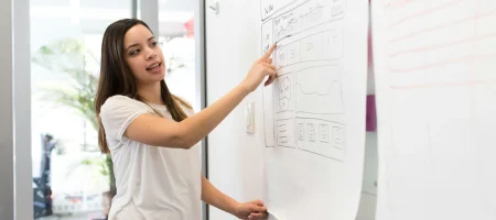 Woman looking at graph